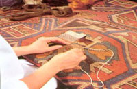 Restauro di un tappeto